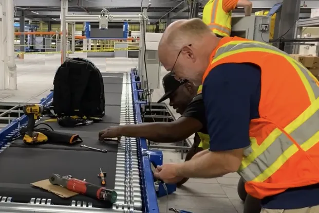 Maintenance Workers with Conveyor Maintenance Workers with Conveyor