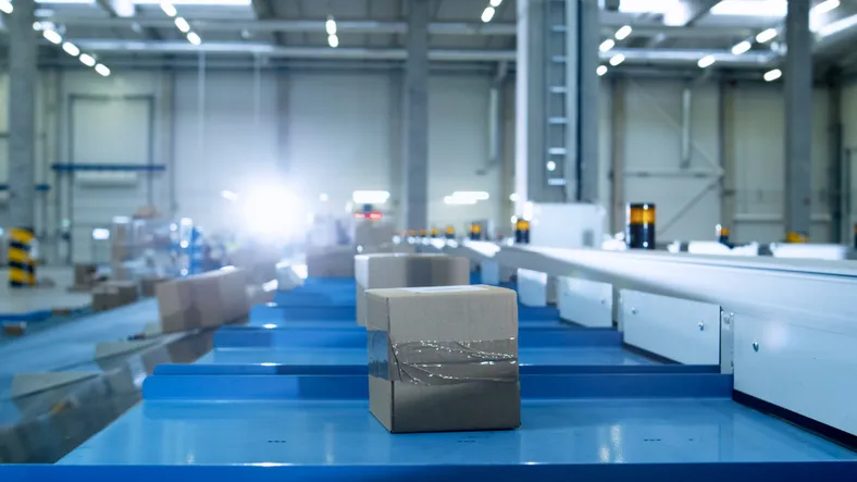 Parcels are Moving on Belt Conveyor at Post Sorting Office. Box POV. Parcels are Moving on Belt Conveyor at Post Sorting Office. Box POV.